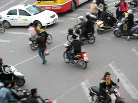 Motorbike crossing street in Hanoi