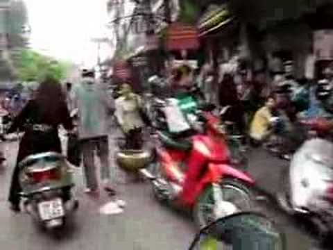 Riding a motorbike in Hanoi