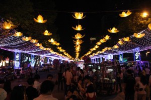 Vietnamese stroll the decorated streets