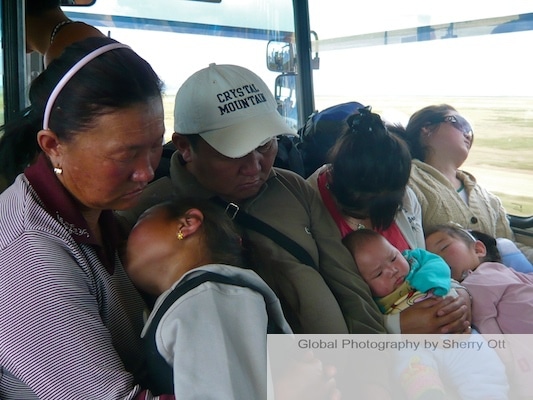 sleeping on a mongolian bus