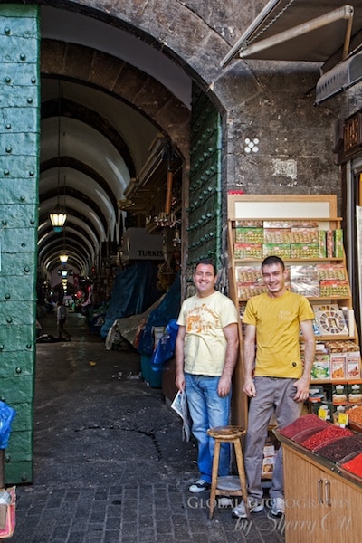 two men at the entrance of the spice market