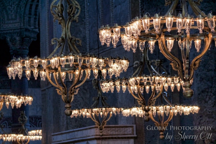 Lights hang from the tall ceiling of Hagia Sophia