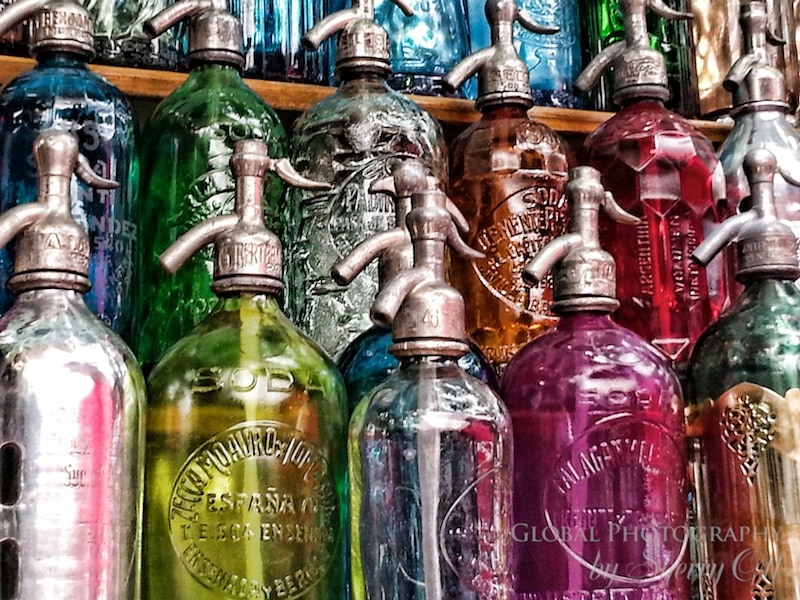 Colorful glass bottles at the antique market