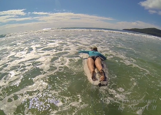 try new things surfing noosa