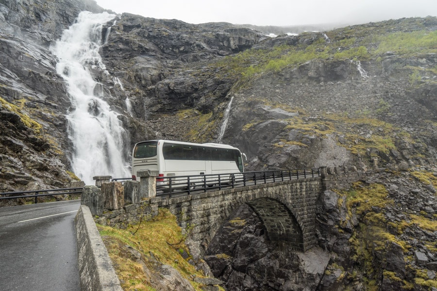 A bus crossing a bridge on Trollstigen Road in Norway