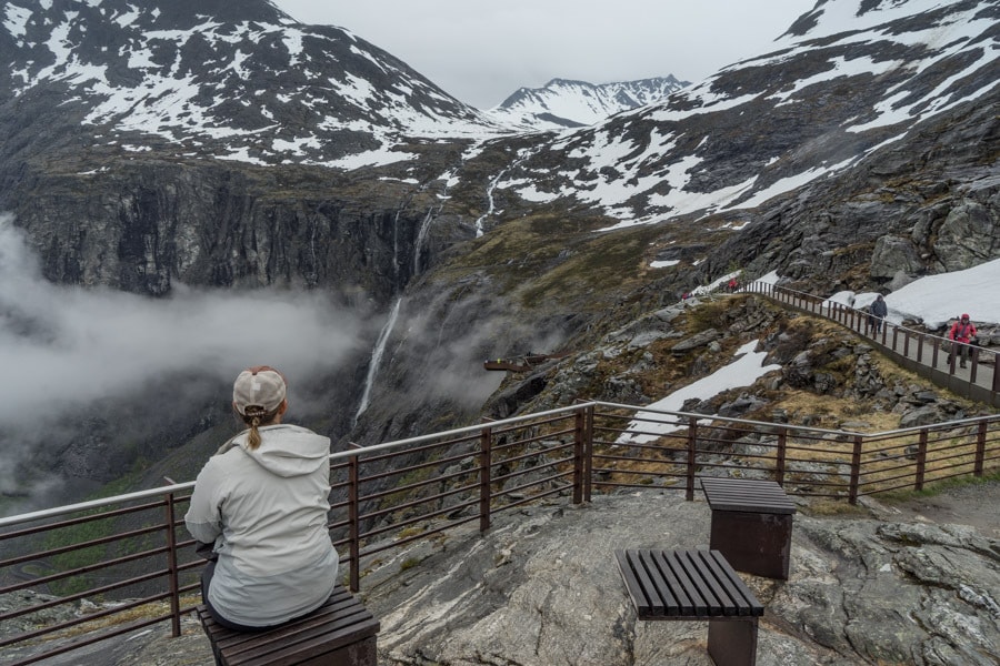Me, sitting on a bench at a Trollstigen road viewpoint