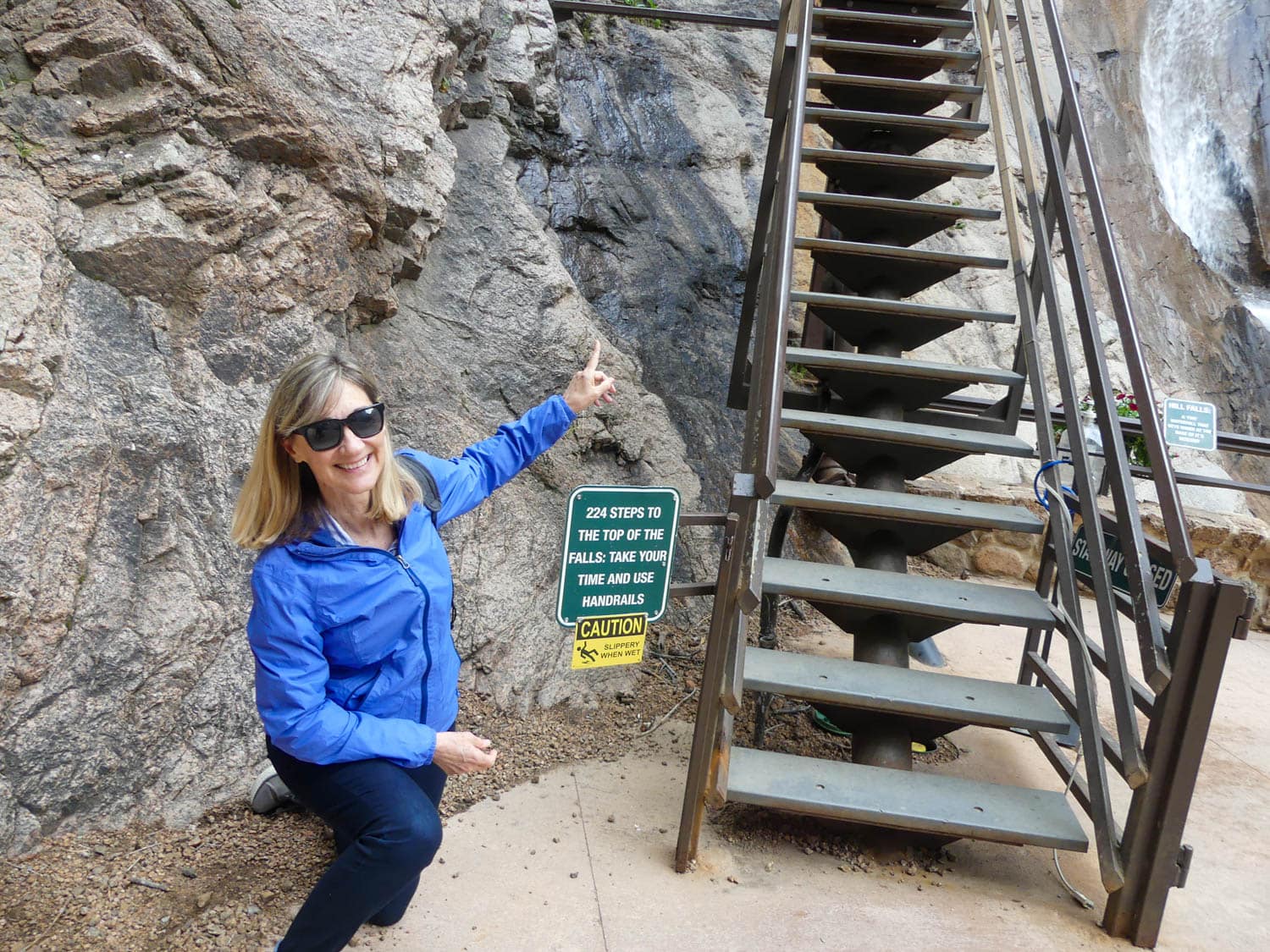 Author Sherry Spitsnaugle gets ready to climb the steps at Broadmoor Seven Falls during a weekend in Colorado Springs.