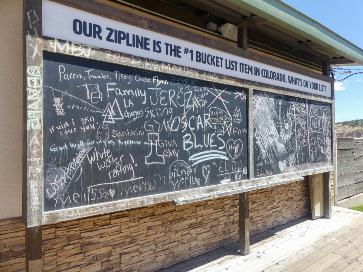 Sign that reads Our Zipline is the number one bucket list item in Colorado